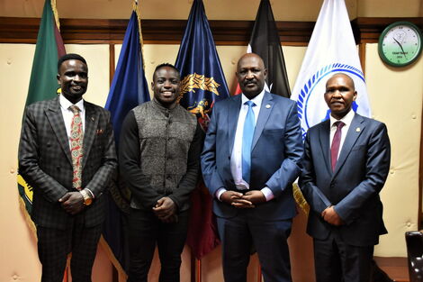 Kenyan sprinter sensation Ferdinand Omanyala at Inspector General of Police Hillary Mutyambai's office at Jogoo House on Friday, December 3.