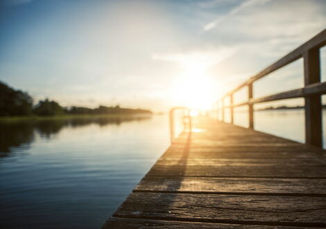 Sun shines over a lake