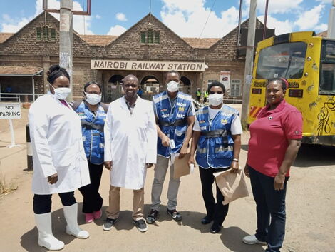 Ministry of Health officials preparing to random screen members of the public for COVID-19 symptoms at Nairobi Railway Station, in Nairobi on Saturday, March 21, 2020.