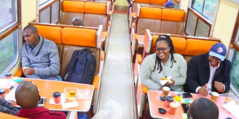 Passengers enjoying themselves on the revamped train to Kisumu from Nairobi on Saturday, December 4 2021