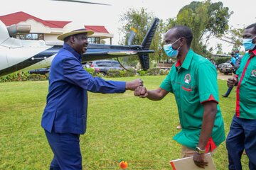 ODM leader Raila Odinga and MP named Wilson Sossion at a party in Bomet on Saturday, September 19.