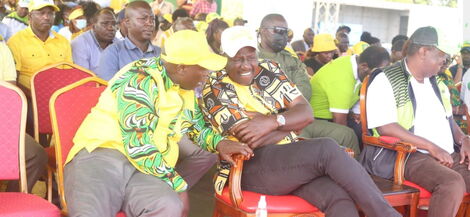 Mathira MP Rigathi Gachagua speaks with Deputy President William Ruto during a rally in Kirinyaga County on Saturday, January 29. 