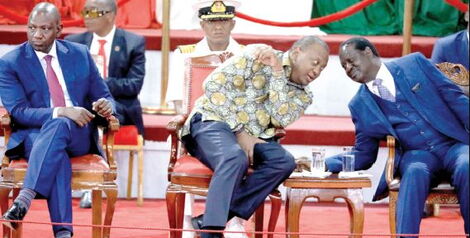 President Uhuru Kenyatta (centre) with Deputy President William Ruto (left) and Opposition leader Raila Odinga during the launch of the BBI report at the Bomas of Kenya, Nairobi on November 27.