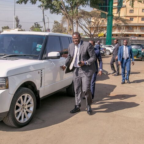 Nairobi Senator Johnson Sakaja alighting from his Range Rover Vogue