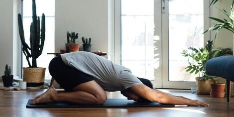 An image of a man performing stretches'.