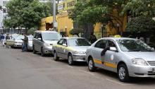Taxis pictured while parking in a street in Nairobi