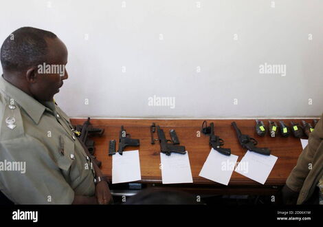 the-guns-and-grenades-found-in-the-residence-of-kenyan-elgiva-bwire-oliacha-alias-mohamed-seif-are-displayed-during-his-sentencing-in-nairobi-october-27-2011-oliacha-who-pleaded-guilty-to-a-grenade-attack-i