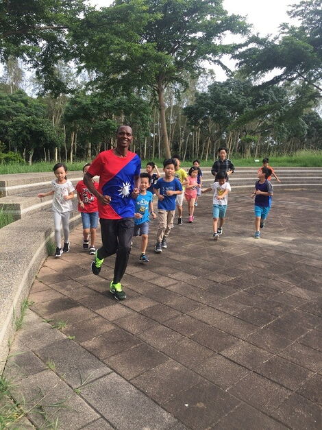 Thomas Muli, a Kenyan athlete based in Taiwan, Asia trains with young Taiwanese