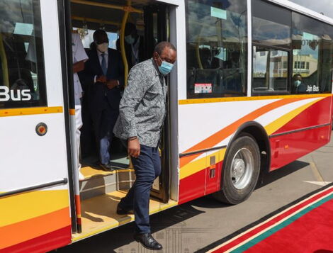 President Uhuru Kenyatta alighting from a Nairobi Commuter Bus in November 2020.