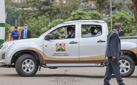 President Uhuru Kenyatta being driven by Kitui governor Charity Ngilu at KICC on November 3, 2020.