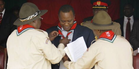 Former President Uhuru Kenyatta with former Chief Scout Ole Kaparo at an event in State House Kenya. 