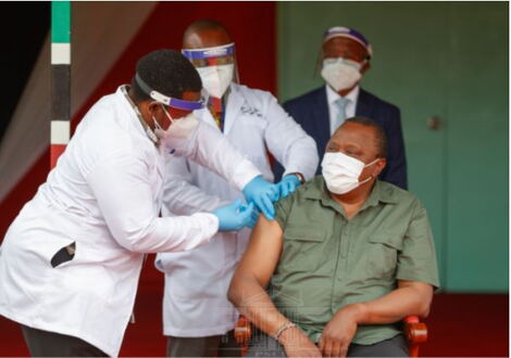 President Uhuru Kenyatta takes the Covid-19 Vaccine at State House, Nairobi on March 26, 2021.