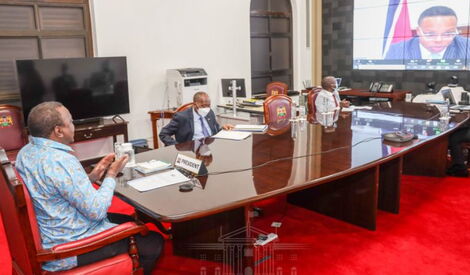 President Uhuru Kenyatta delivering the opening statement during a virtual townhall meeting of the OACPS on April 8, 2021.