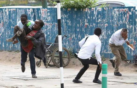 Victor Muyakane saving a man attacked by bees in 2017.
