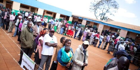 File photo of Kenyans in a queue waiting to cast their vote in a past election.