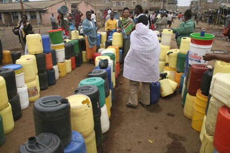 File photo of Nairobi residents queuing for water.