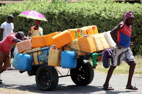 Vendors sell water in Kaloleni estate in Nairobi on March 16, 2017