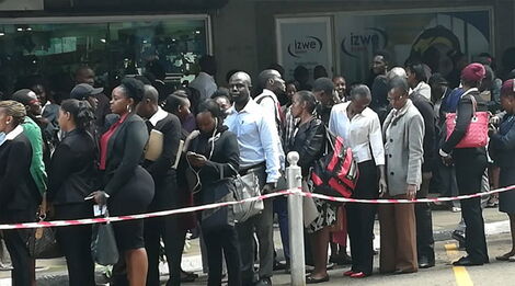 Hundreds of young people line up during an open employment campaign at a city hotel on Saturday May 26, 2018