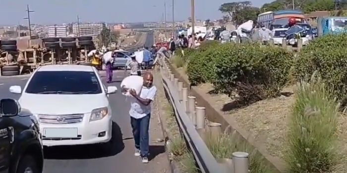 Scramble on Thika Road as Truck Carrying Relief Food Overturns