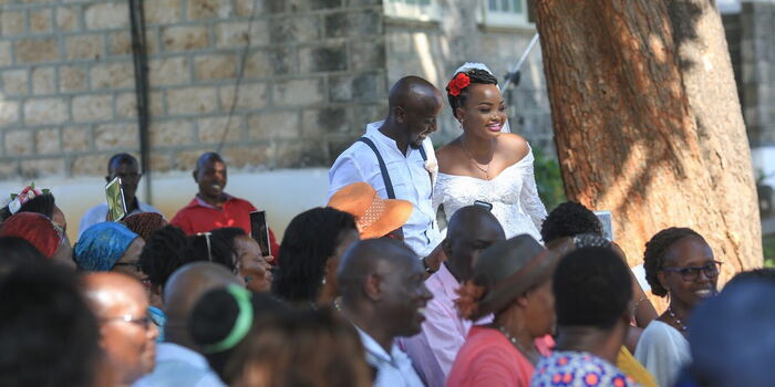 Nation journalist Eunice Kilonzo and Kenya National Chamber of Commerce and Industry (KNCCI) Nairobi director Jesse Muraya pose during their wedding on February 22, 2020 Photo: Twitter