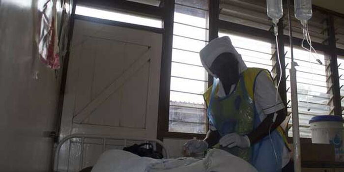 A nurse attends to a cholera patient at a hospital in Kisumu in 2017.