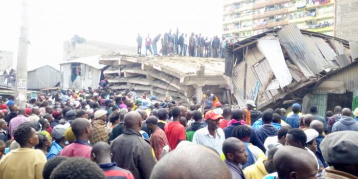 Residents flock the area to aid in the rescue mission after a building collapsed in Tassia estate on December 6.