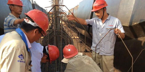 Chinese Citizens at work during the construction of the SGR