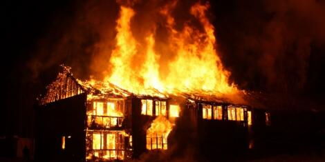 File photo of fire burning down a building late at night