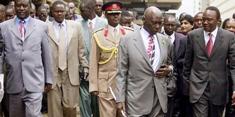 From Left, Raila Odinga, former President Daniel arap Moi and Uhuru Kenyatta pictured heading to a rally in 2002.