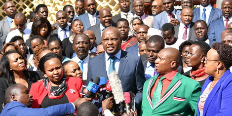 Gatundu South MP Moses Kuria speaking during a press briefing by Ruto-allied MPs on Wednesday, March 11 at parliament.