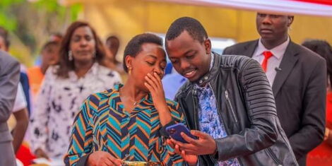 First Lady Mama Rachel sharing a moment with her last-born son George Ruto on October 17, 2022