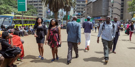 File image of Kenyans pictured walking in the capital, Nairobi