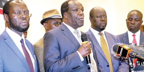 From left: Kisumu Governor Anyang’ Nyong’o, Council of Governor chairman Wycliffe Oparanya and Trans Nzoia governor Patrick Khaemba address the press in Nairobi on December 16, 2019.
