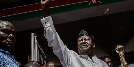 Opposition leader Raila Odinga gestures before his swearing in as the people's president on January 30, 2018 at Uhuru Park Nairobi.