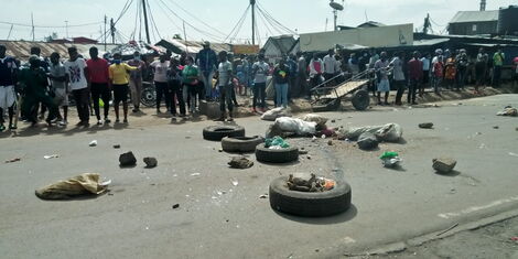 The rioting youth in Maringo area, South B estate block the road during protests on May 14, 2020.