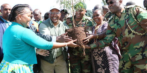 From left: Samburu West MP Naisula Lesuuda, Environment CS Keriako Tobiko, KFS Chief Conservator of Forests Julius Kamau and Samburu woman representative Maison Leshomo plant trees in Kirisia forest on December 30, 2019