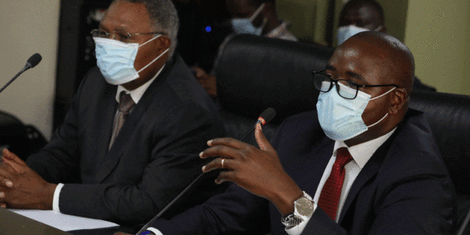 Unclaimed Financial Assets Authority chief executive John Mwangi (right) with director Thomas Mwadegu during parliamentary grilling.