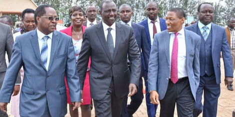 Embu Governor Martin Wambora (left) Deputy President William Ruto (centre) with Professor Paul Musili at the University of Embu on October 25, 2018.