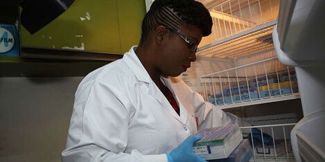 A scientist isolates wild poliovirus at the Kenya Medical Research Institute (KEMRI) in Nairobi on July 28, 2016.
