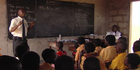 A file image of a teacher in a classroom