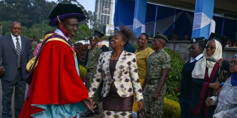 This image has an empty alt attribute; its file name is dp_william_ruto_l_with_his_wife_rachel_after_he_graduated_with_a_phd_at_uon_december_21_2018.jpg