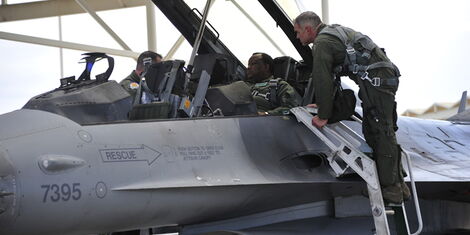 https://www.kenyans.co.ke/files/styles/article_style_mobile/public/images/news/major_brian_snake_crum_the_f-16_fighter_jet_pilot_ensures_that_retired_general_of_the_kenya_defense_forces_julius_waweru_karangi_is_well_prepared_and_ready_for_take-off._july_2014._photo_credits.jpg?itok=U4lWLO53 https://www.kenyans.co.ke/files/styles/article_style_mobile/public/images/news/major_brian_snake_crum_the_f-16_fighter_jet_pilot_ensures_that_retired_general_of_the_kenya_defense_forces_julius_waweru_karangi_is_well_prepared_and_ready_for_take-off._july_2014._photo_credits.jpg?itok=U4lWLO53