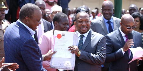 Image result for Uhuru Issuing title deeds in Nairobi